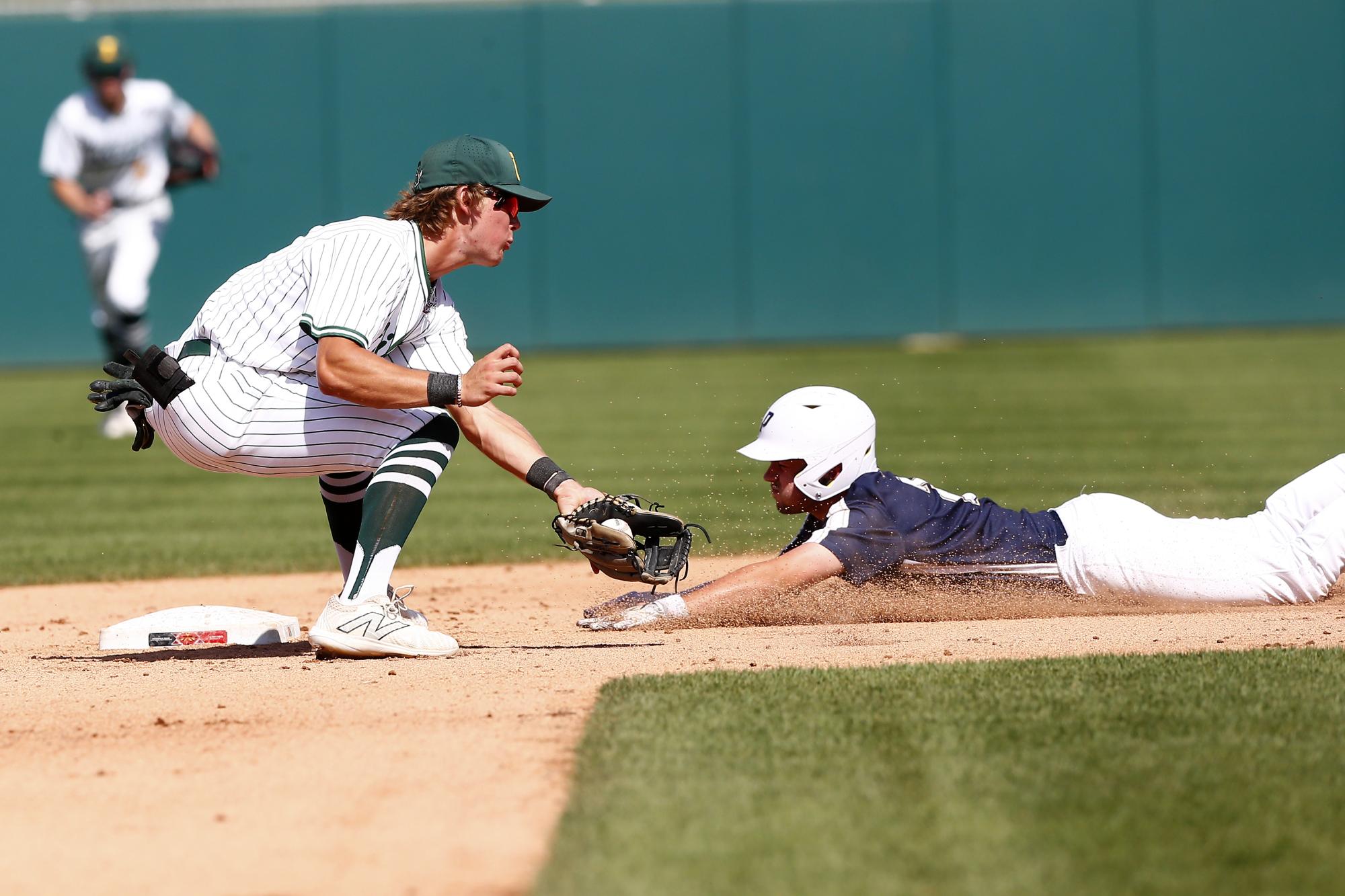 Illiana Christian player applies the tag to Providence runner