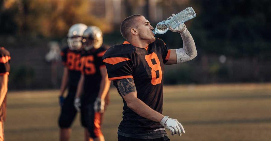 Football Player Hydrating